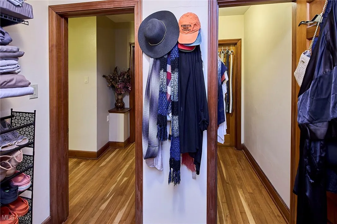 Hallway with wood finished floors
