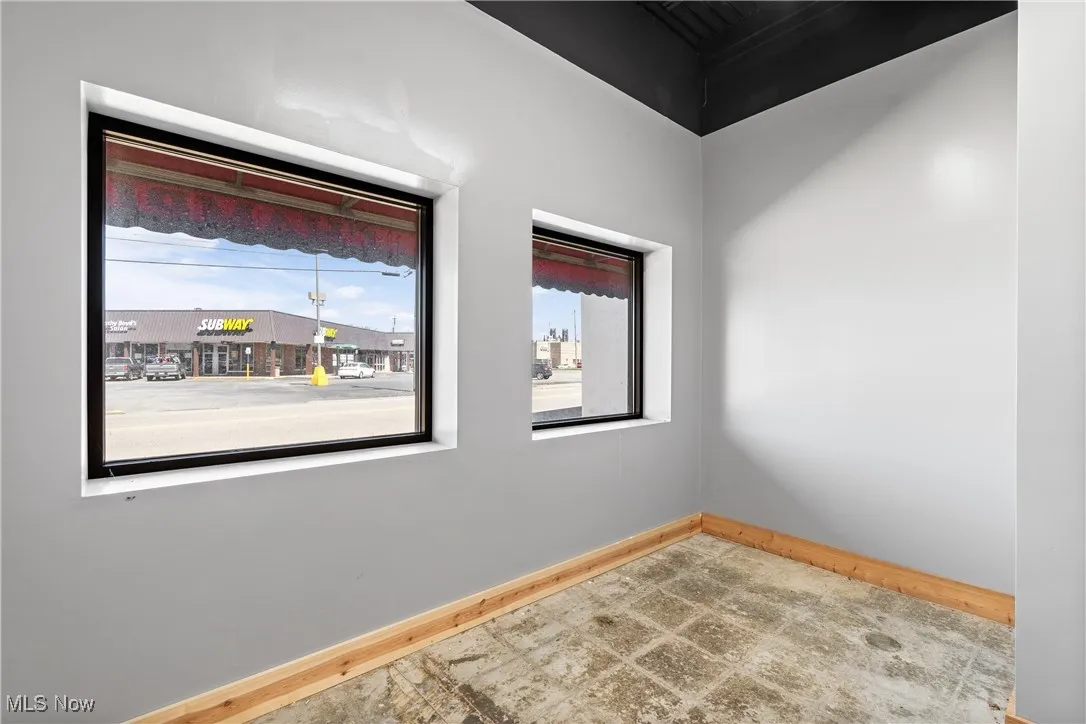 Empty room with baseboards