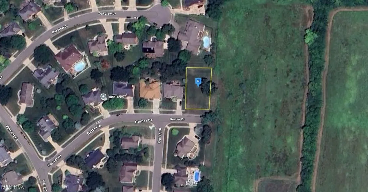 Aerial map of property and surrounding area featuring property boundaries highlighted