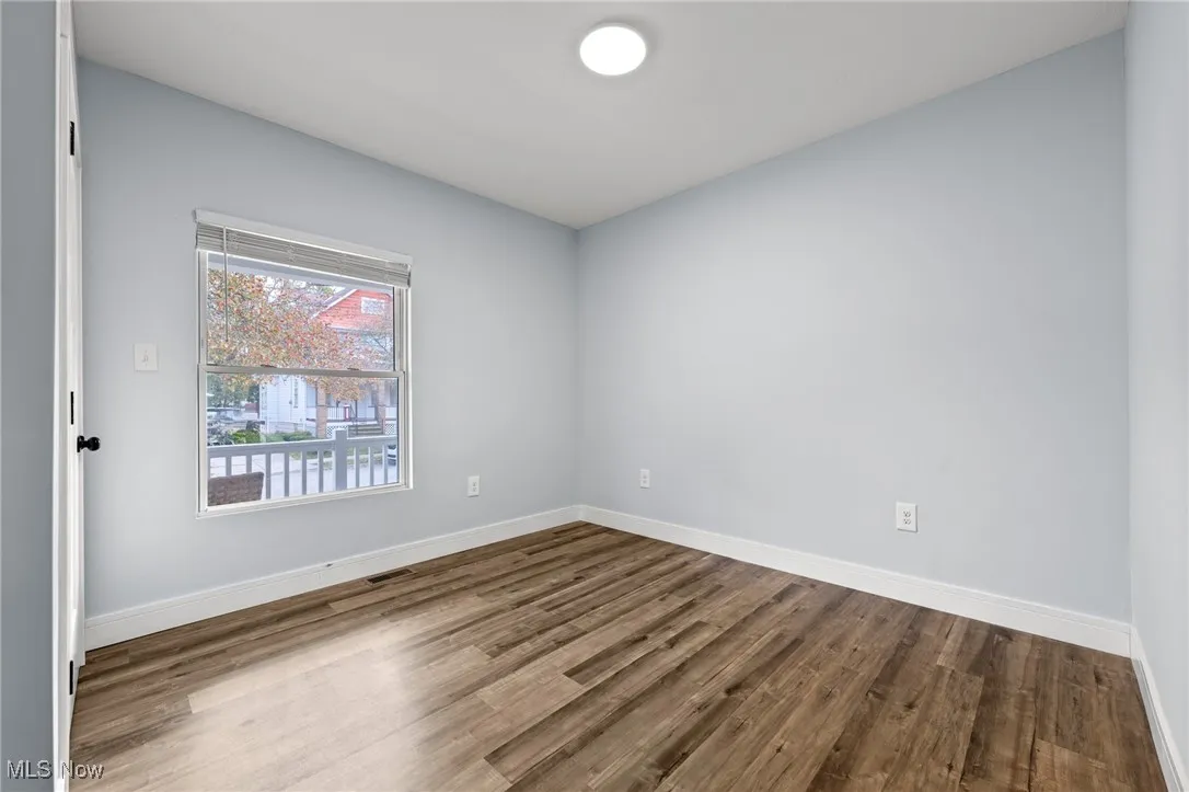 Empty room with wood finished floors