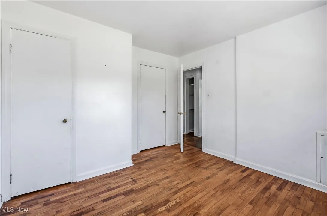 Bedroom 3 with hardwood flooring