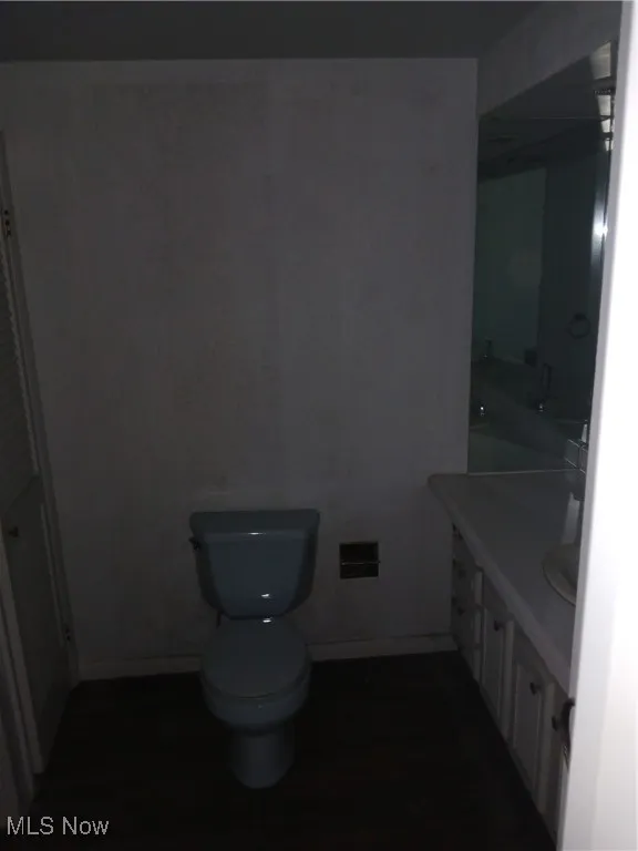 Bathroom with vanity and baseboards