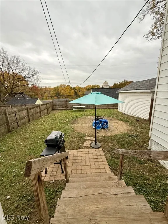 View of fenced backyard