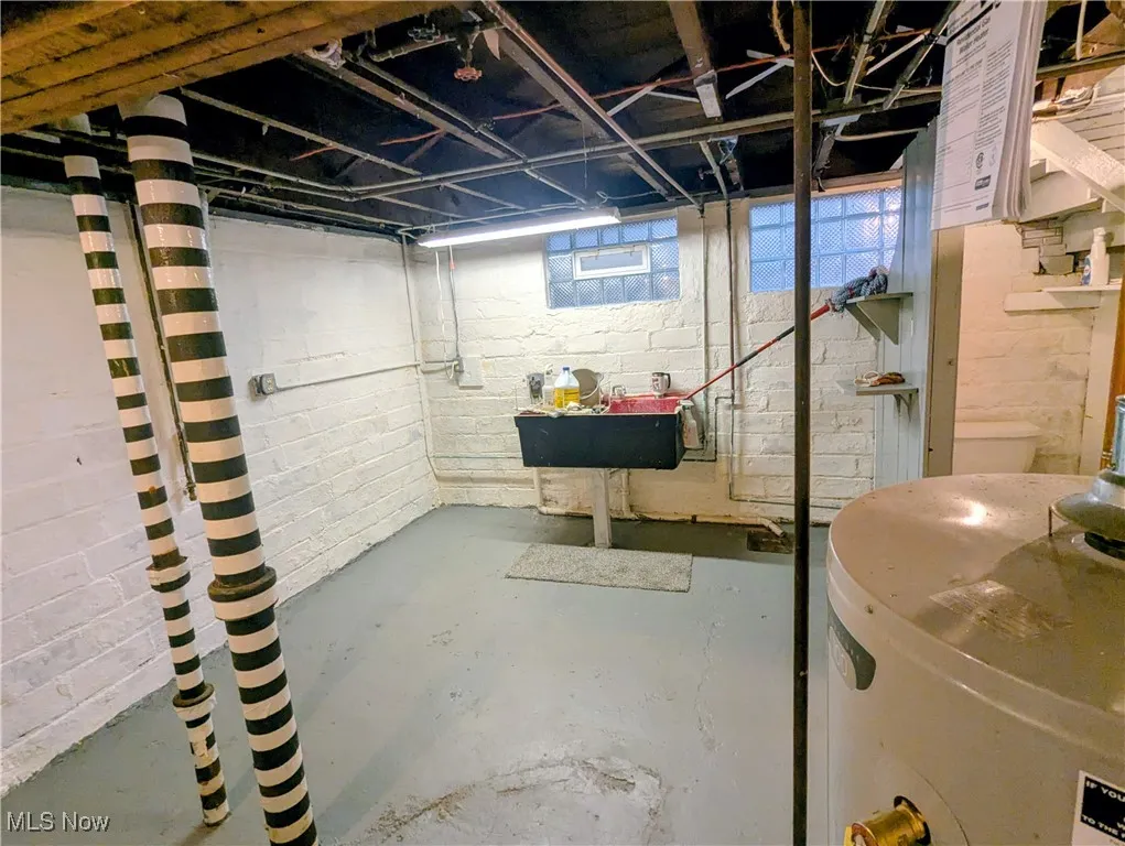 Basement with utility sink and washer/dryer hookup