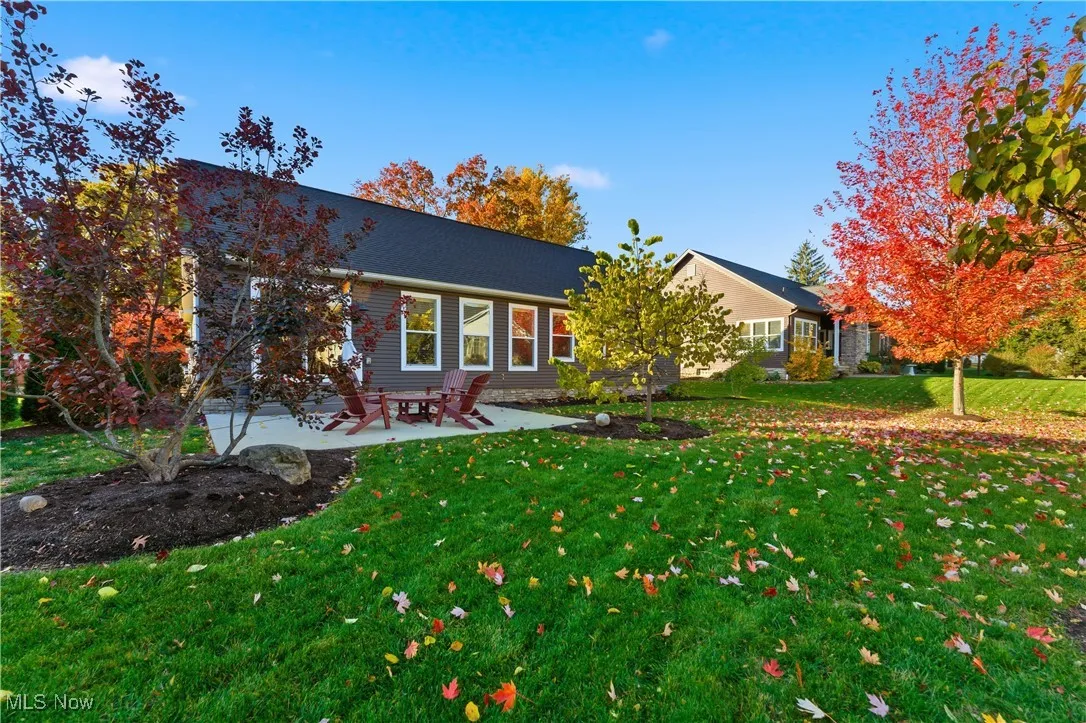 View of front of home featuring a patio area and a front yard
