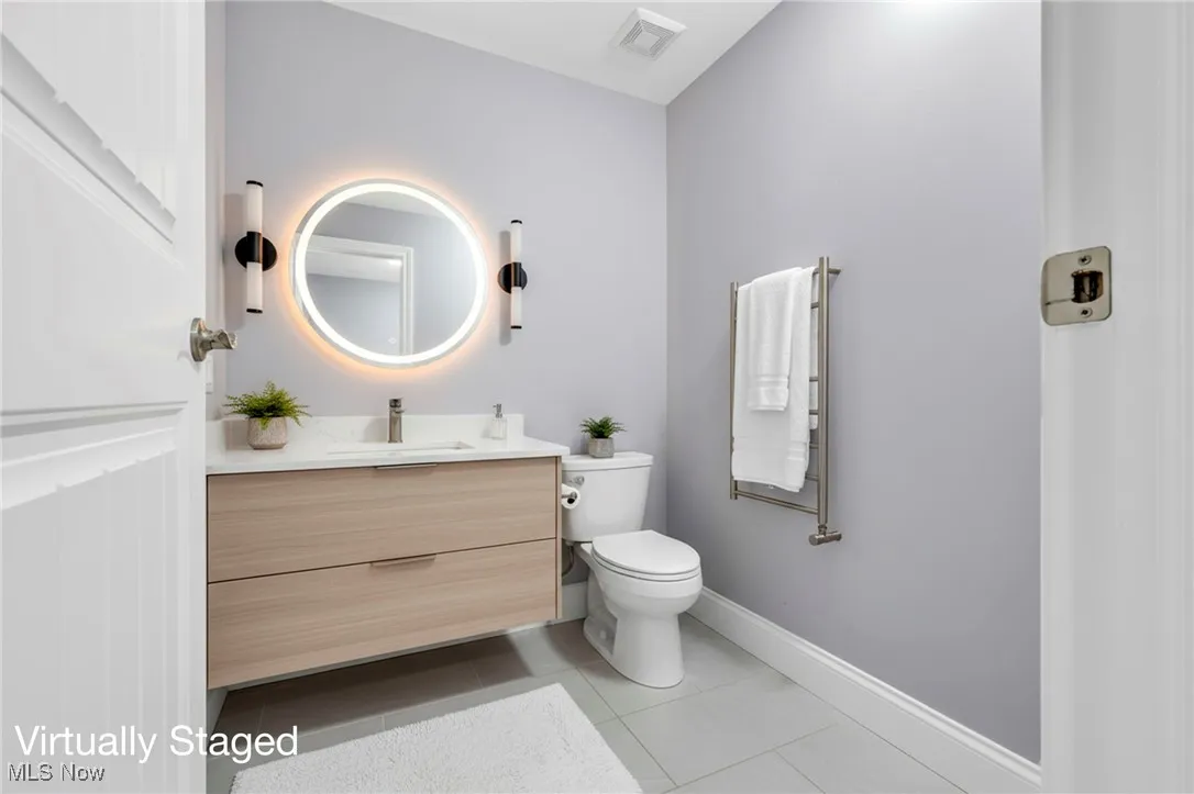 Basement half bath has roughed-in plumbing and this photo is virtually staged.  See Attached estimate for completing half bath.