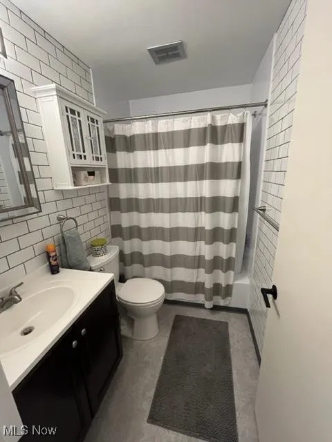 Newer cabinets, lighting, fixtures and Subway tile