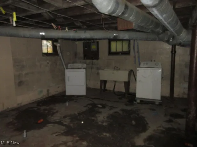 Basement featuring washing machine and dryer