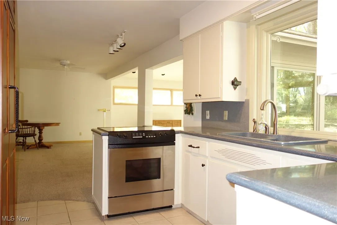 Kitchen w/ Open flow to Family Room and Dining Room