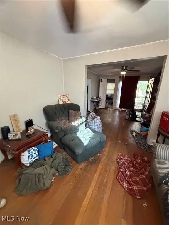 Living area with hardwood / wood-style flooring