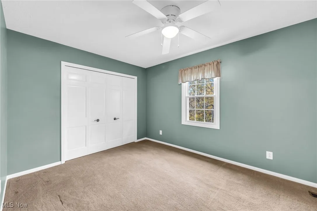 Bedroom 4 with spacious closet at center