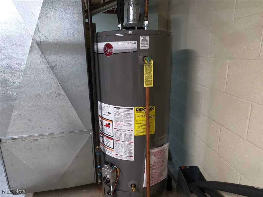 Utilities featuring gas water heater and heating unit