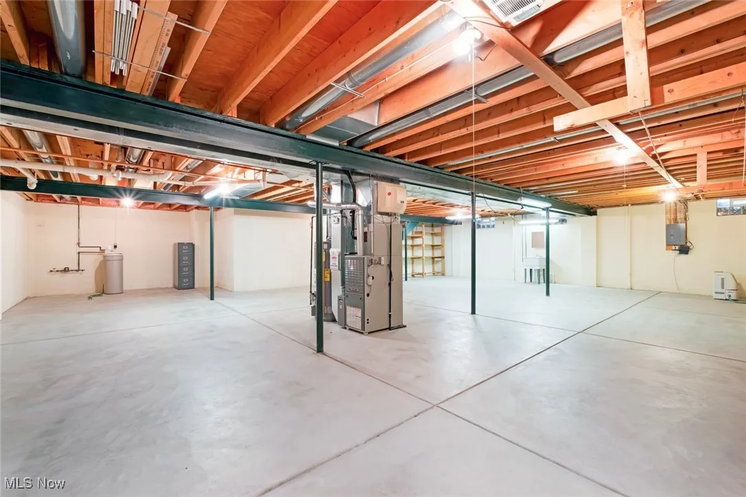 Unfinished basement with heating unit