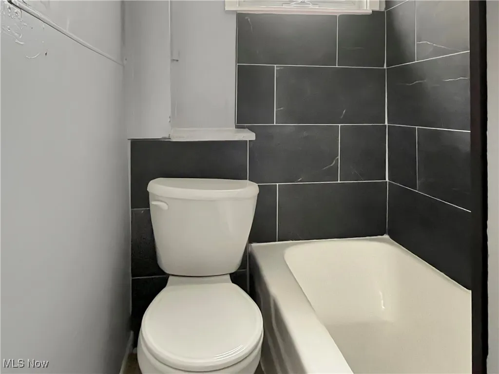 Bathroom with tile walls
