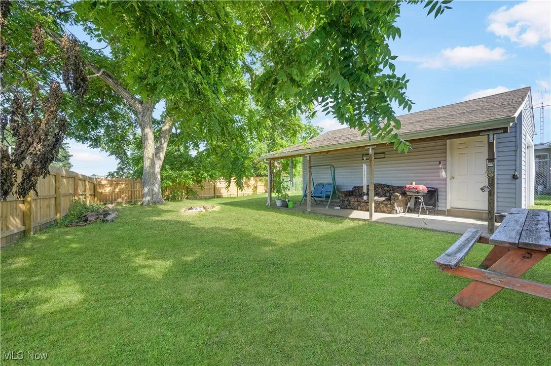 View of fenced backyard