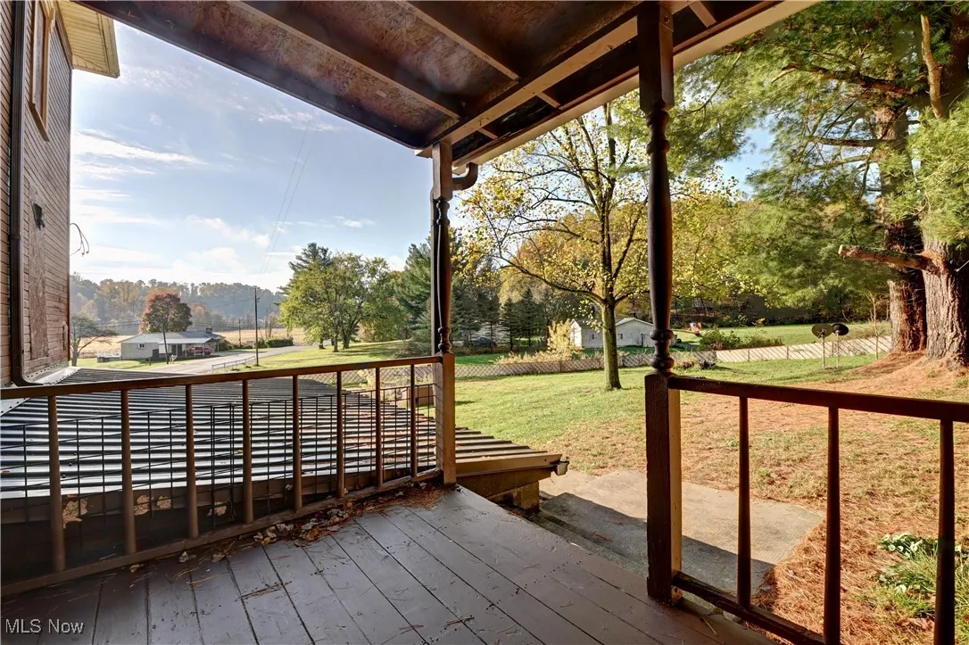 Deck featuring a yard