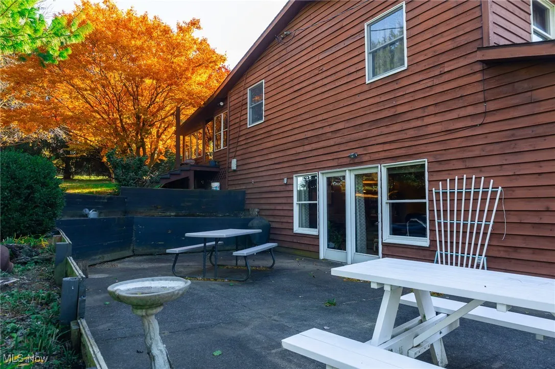 View of patio with outdoor dining area