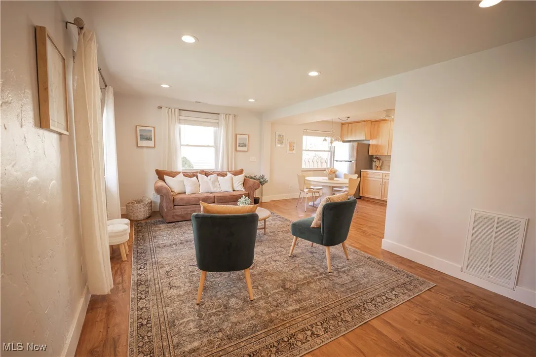 Living room featuring recessed lighting and light wood finished floors