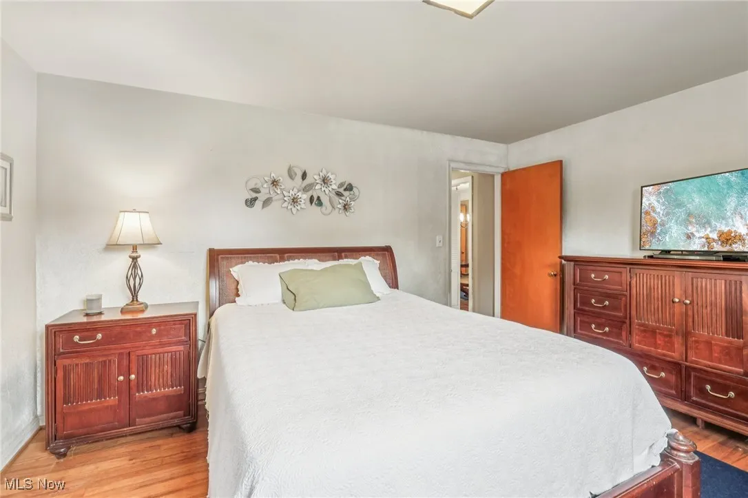 Bedroom featuring wood finished floors