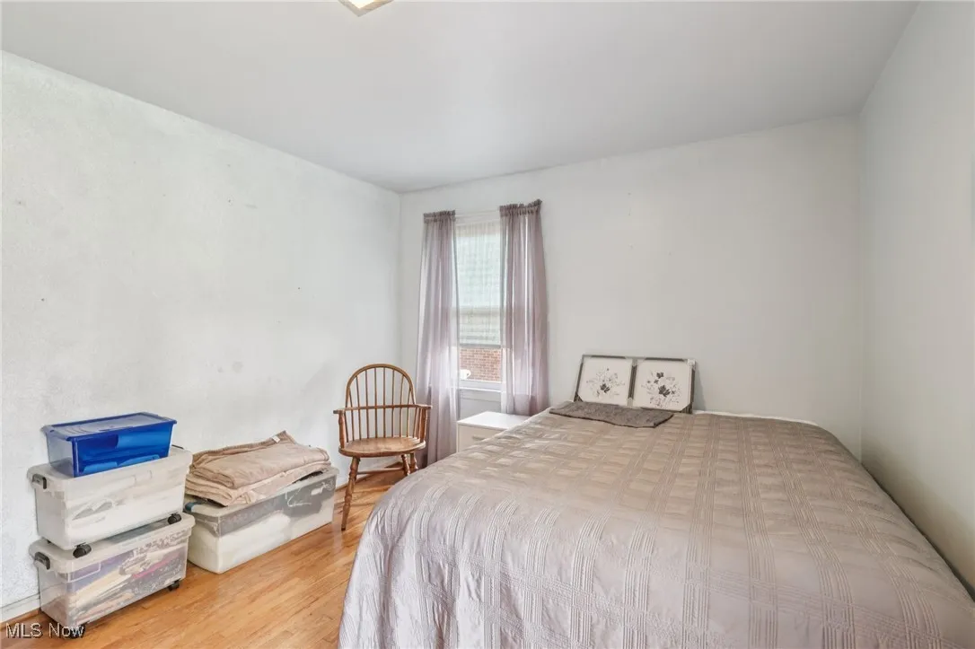 Bedroom with light wood finished floors