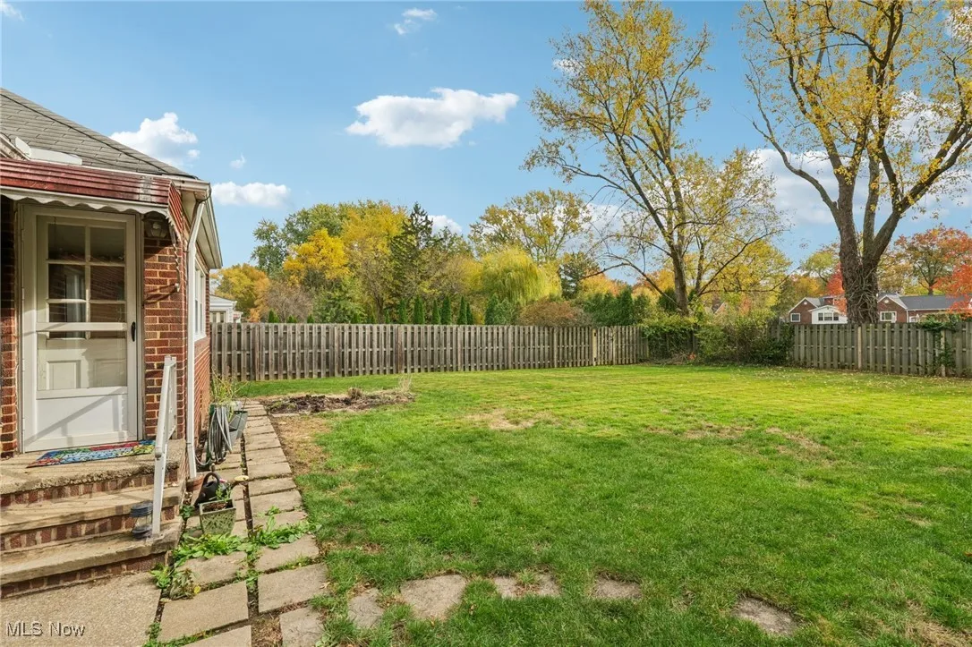 View of fenced backyard