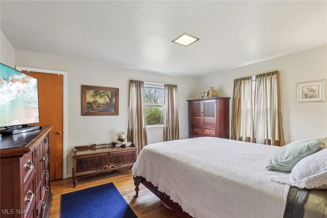 Bedroom featuring wood finished floors