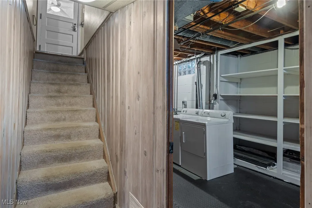 Washroom with washing machine and dryer