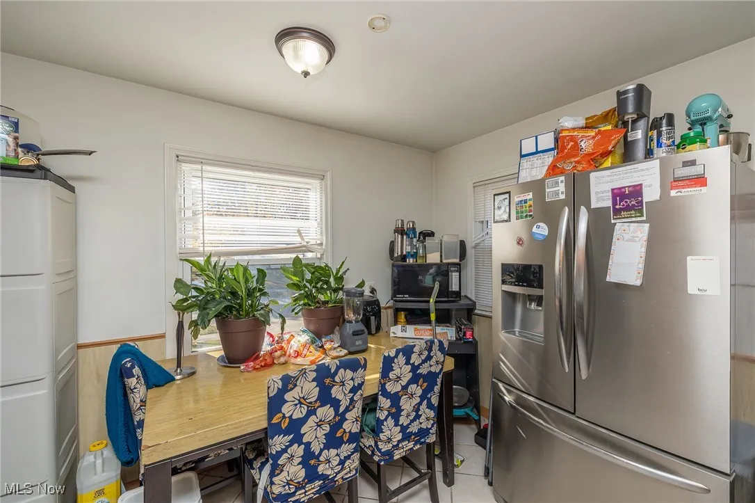 Dining room featuring light tile patterned floors