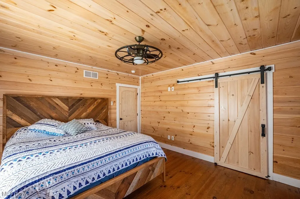 View of barn door for walk in closet.