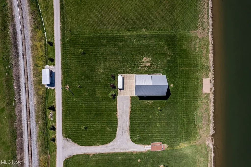 Aerial view showing entire property.