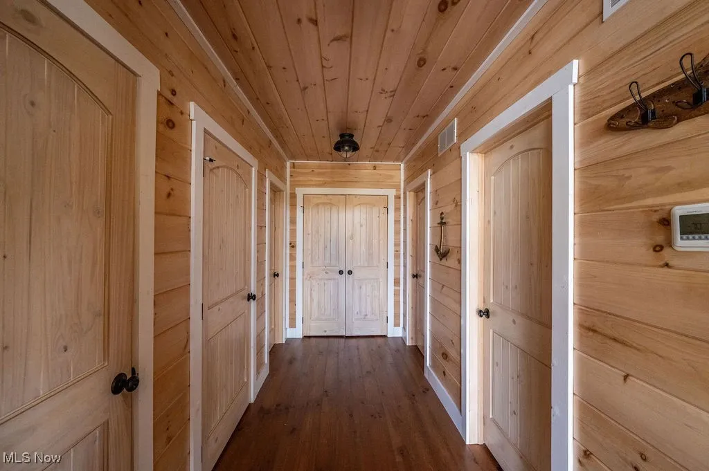 Wide hall to 2 bedrooms, full bath, storage/furnace room, laundry and entry from lower level.