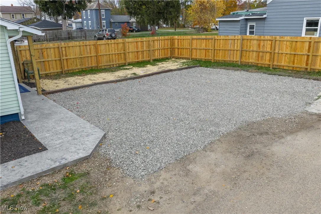 View of fenced backyard