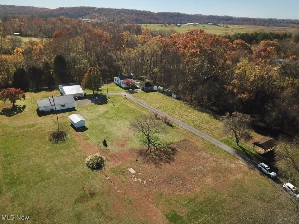 Aerial overview of property's location with Rail Trail behind it