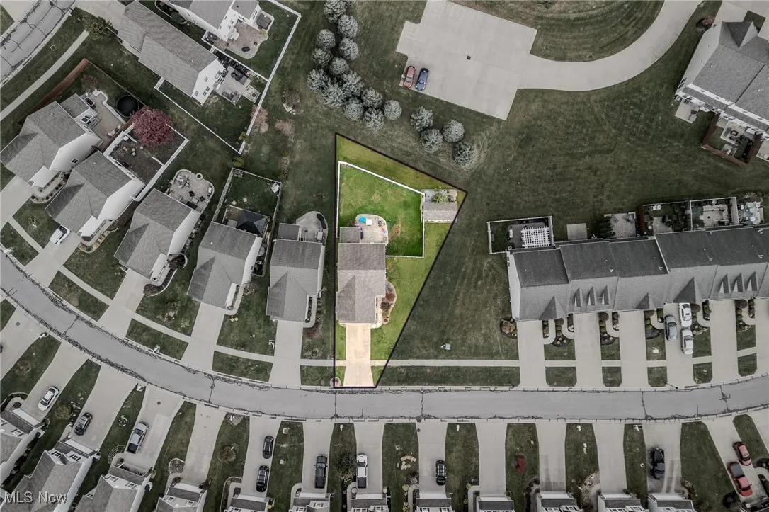 Aerial overview of property's location with property parcel outlined