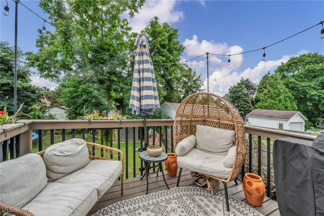 Wooden terrace with an outdoor hangout area