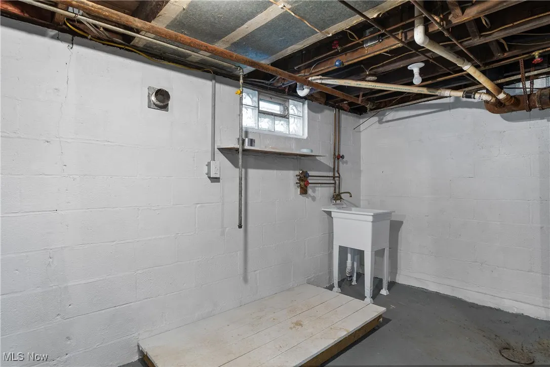 Below grade area featuring a sink