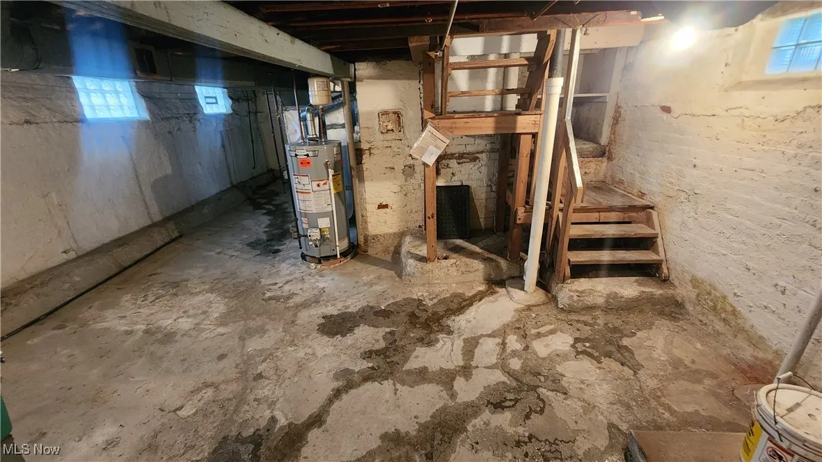 Basement view with stairs to first floor kitchen