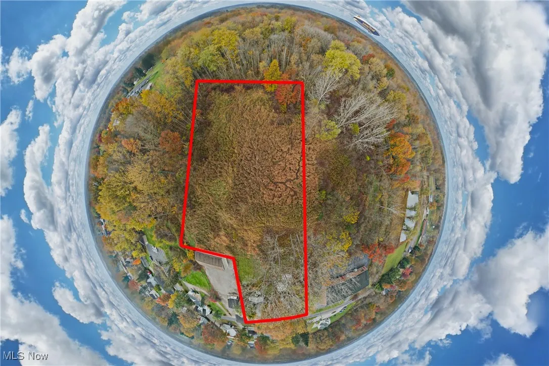 Aerial overview of property's location with property parcel outlined