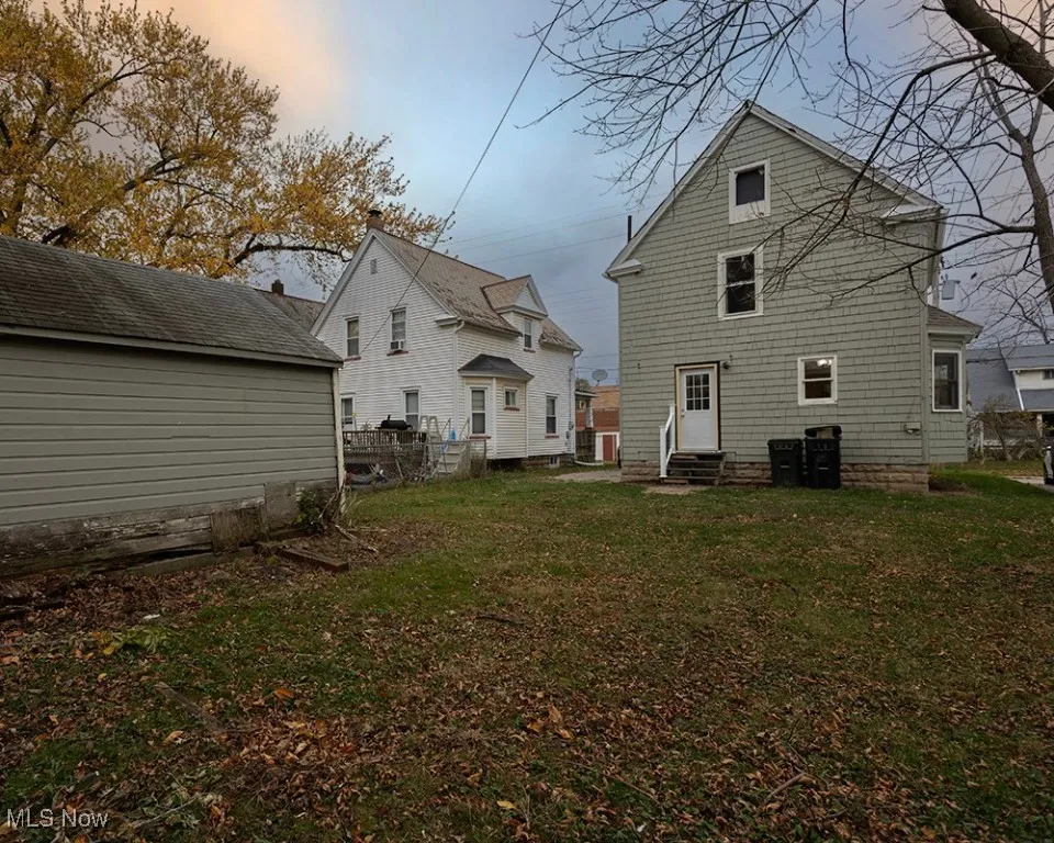 Back of house featuring entry steps and a patio area