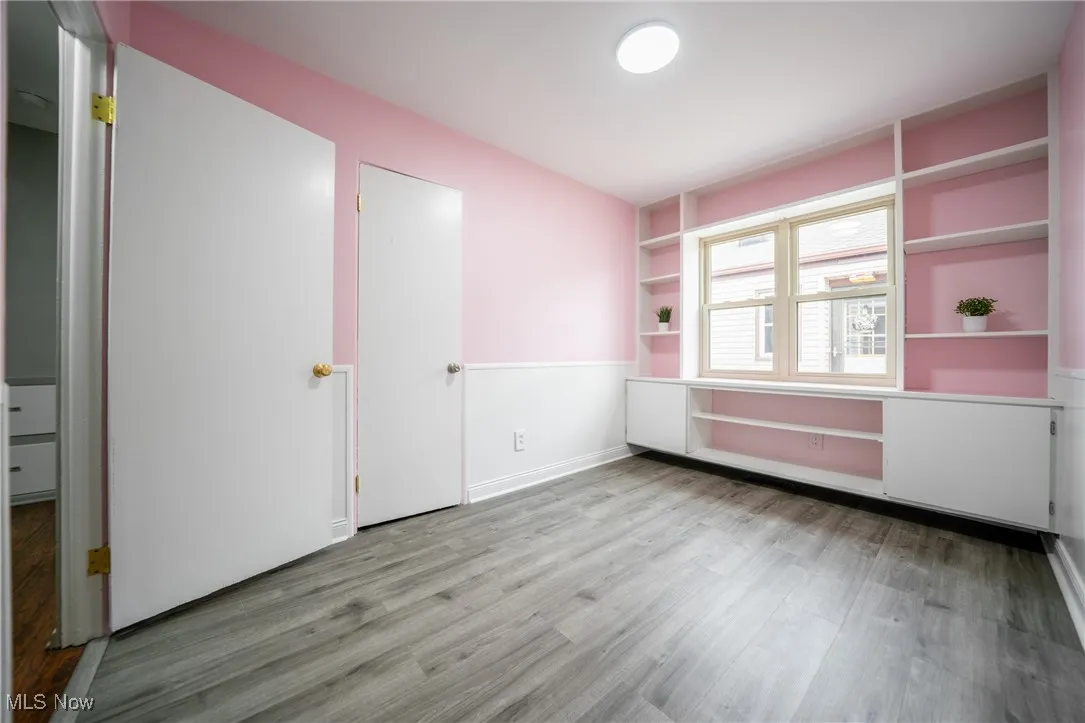 Unfurnished bedroom featuring light wood finished floors