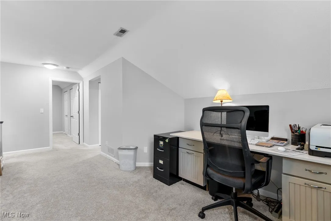 The Loft area is open and overlooks the Living Area