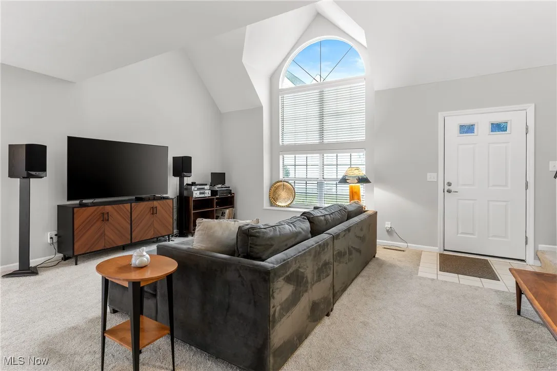 Step into the bright vaulted ceiling Living Room