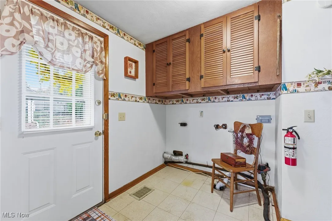 Laundry area.  Door to backyard.