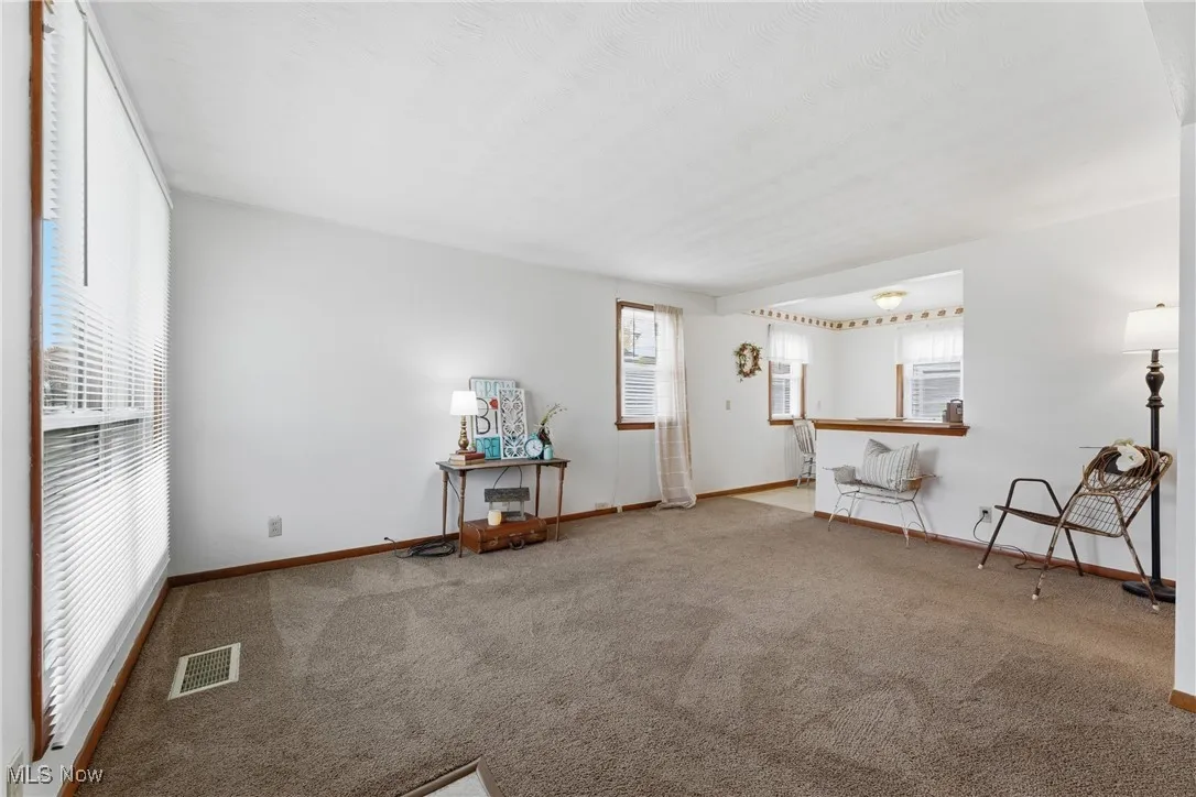 Light and bright living room with freshly cleaned carpets.