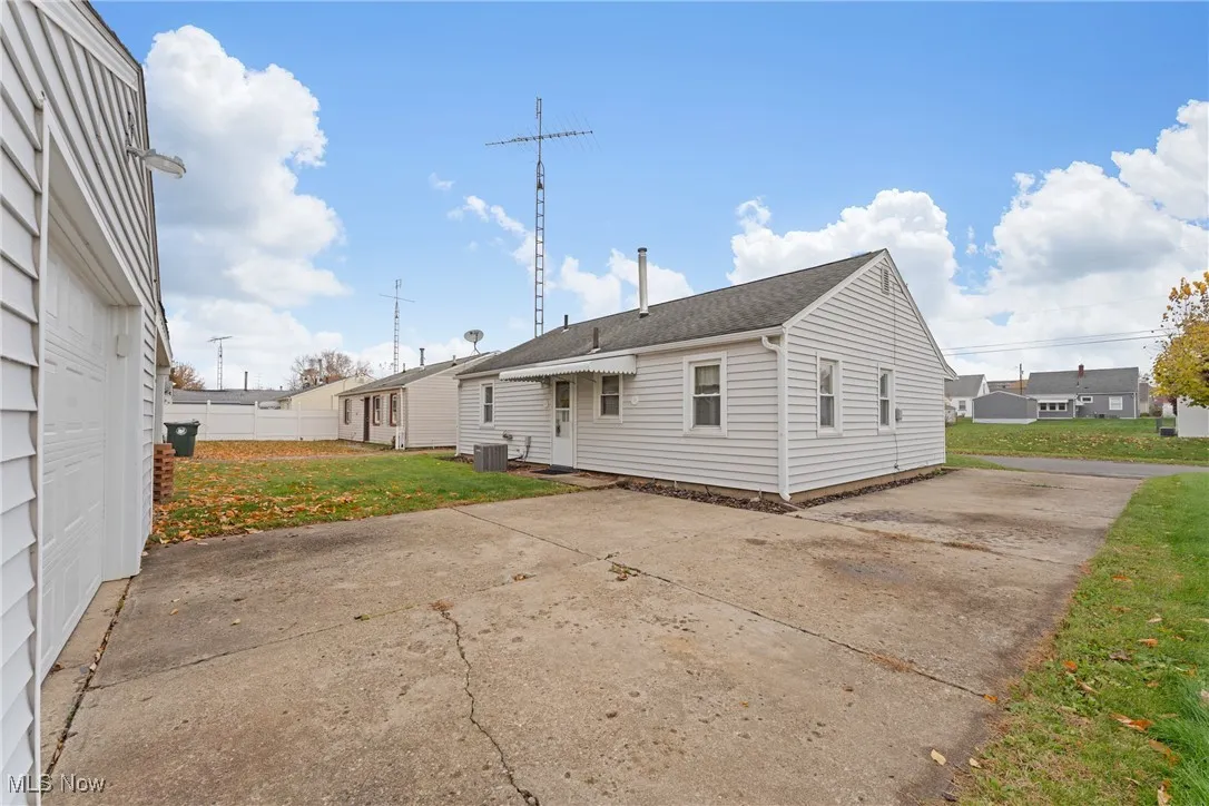 Large cement driveway.