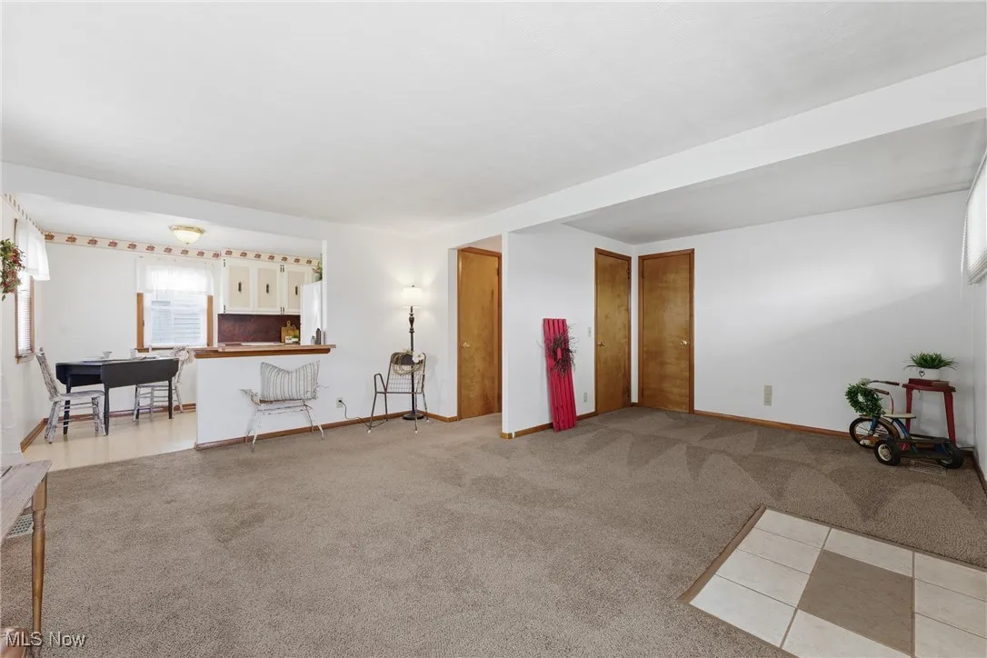 Large hall closet to the far right.  Closet and door to the hallway still intact for the third bedroom.