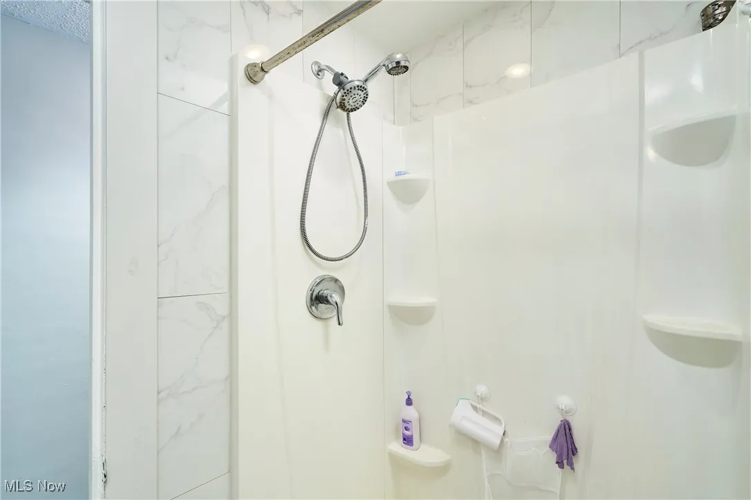 Bathroom with a shower stall