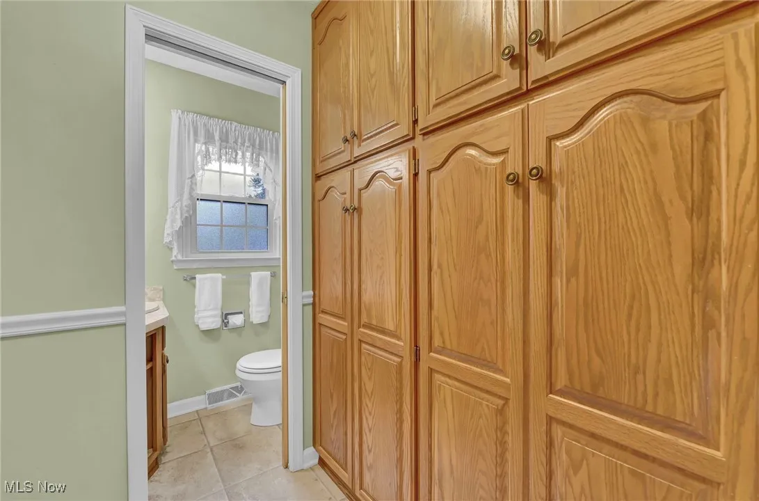Behind this beautiful cabinetry is tons of storage from floor to ceiling!