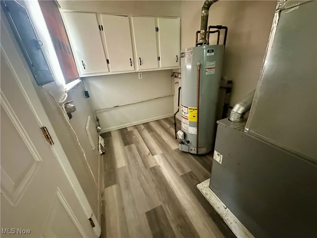 Utilities with heating unit and water heater