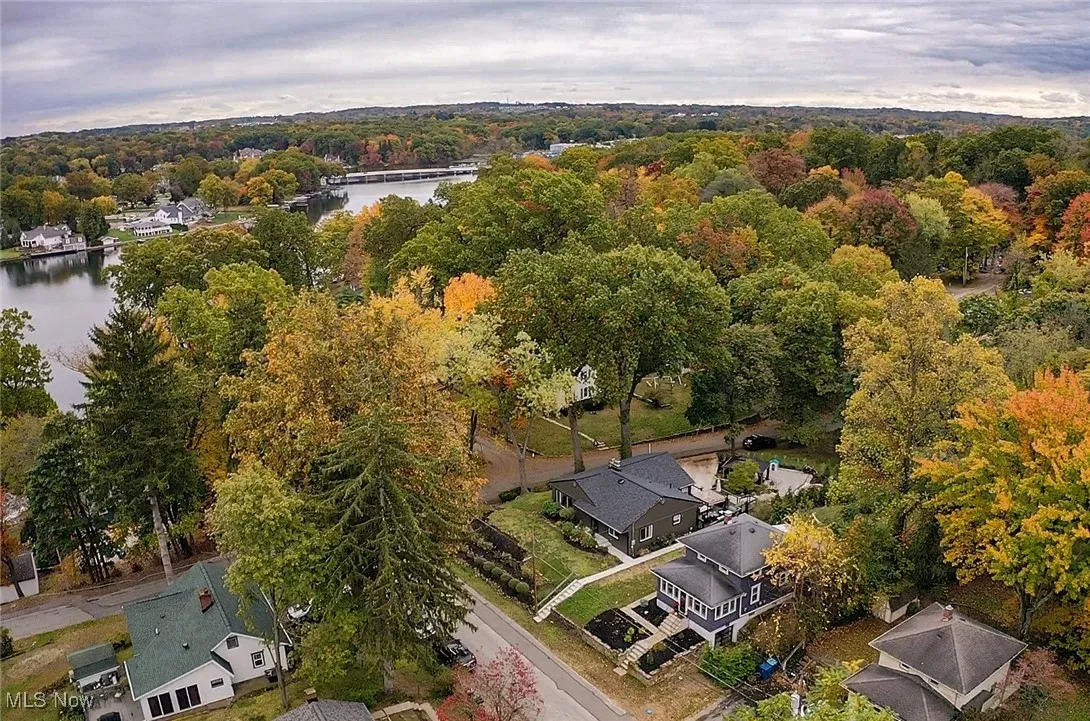 Bird's eye view of a large body of water and a heavily wooded area